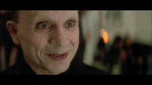 "We've met before, haven't we?" Robert Blake as the Mystery Man. 